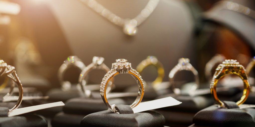 Various types of rings, including engagement rings, wedding bands, and fashion rings.